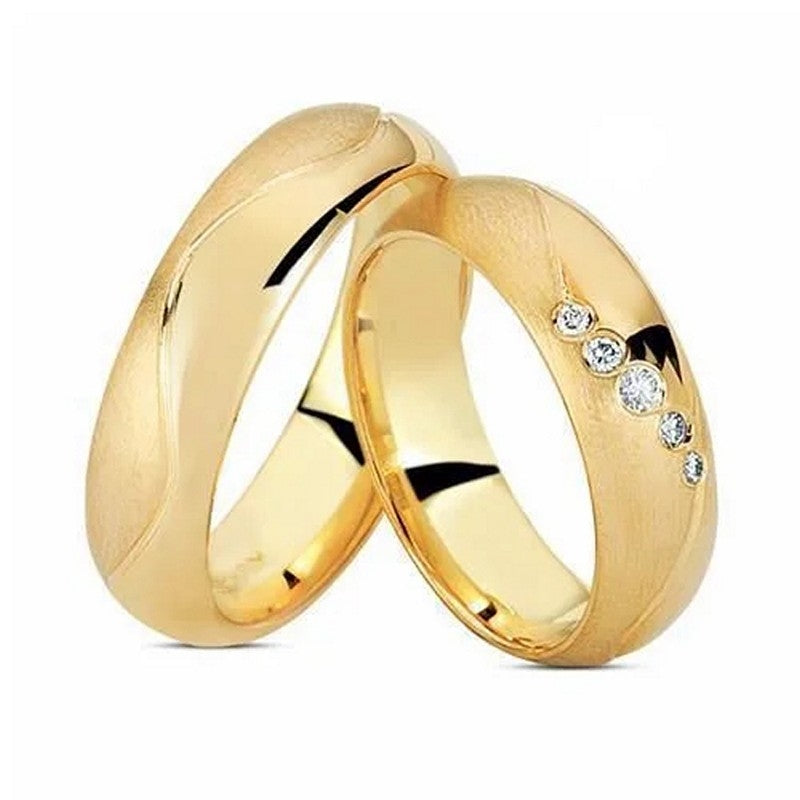 Nuran unikke vielsesringe i 8 eller 14 kt guld med 0,09 ct diamanter, silkeblød mat og poleret overflade, 5 mm bredde.